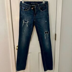 American Eagle Women's Dark Blue Super Stretch size 6 distressed Jeans